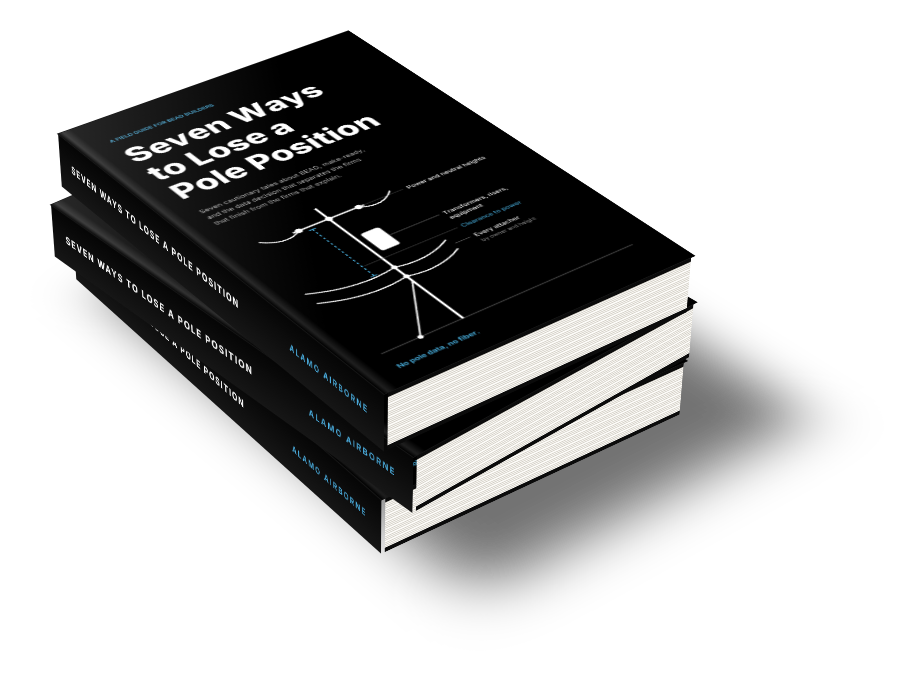 Stack of the hardcover field guide Seven Ways to Lose a Pole Position
